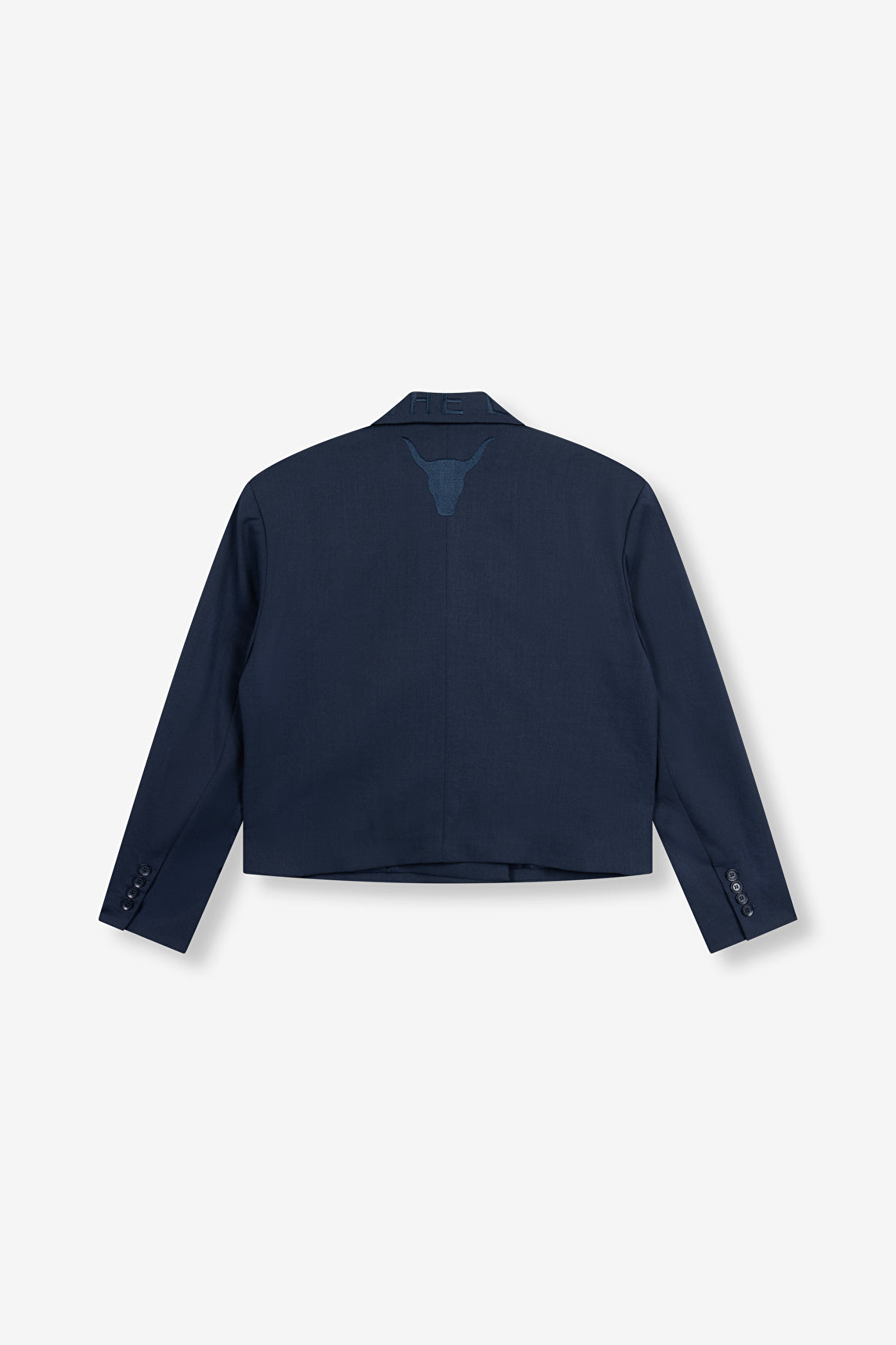 Blazer double boutonnage bleu marine Alix The Label vu de dos avec broderie tête de taureau.
