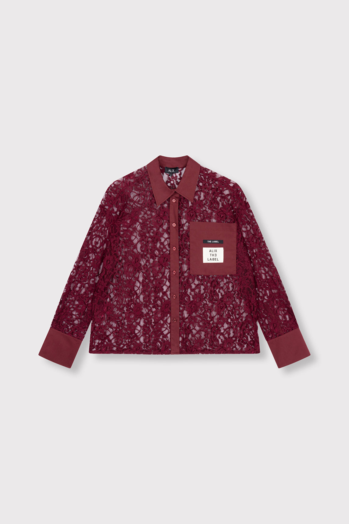 Chemise femme bordeaux en dentelle avec détails contrastants sur la poche poitrine, coupe décontractée et élégante