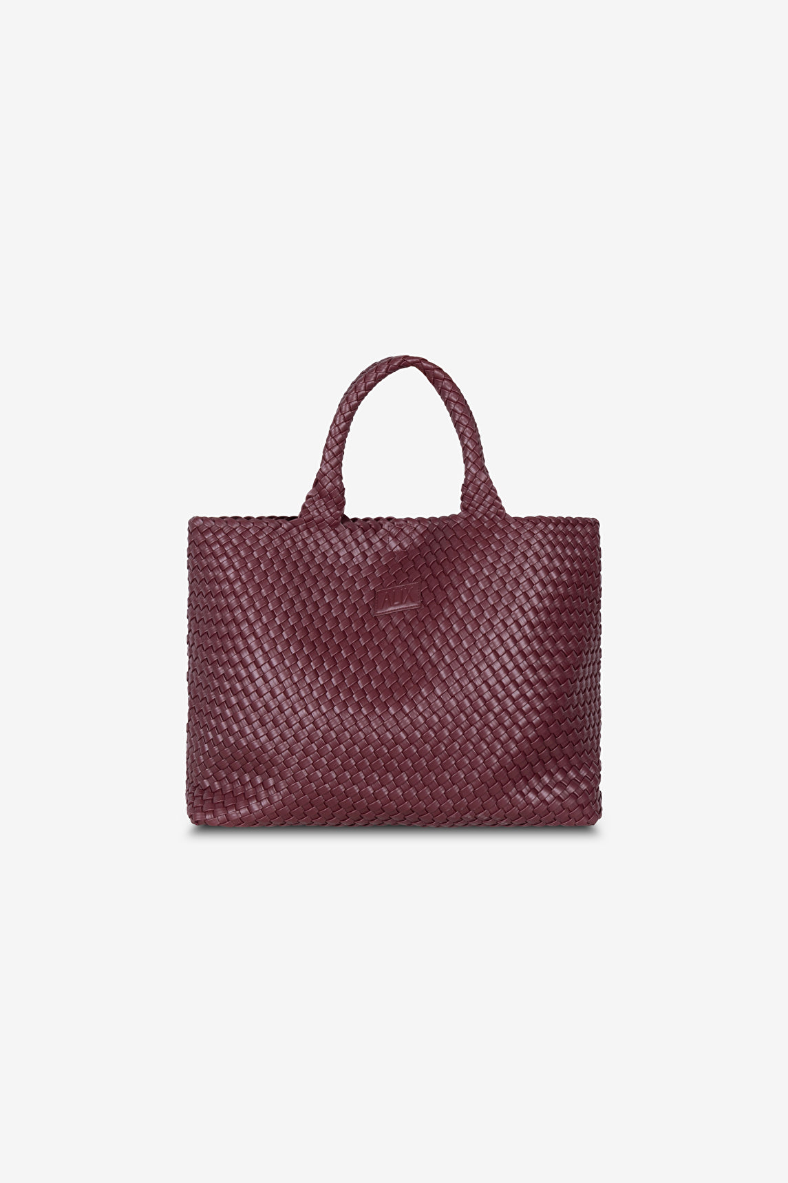 Braided Shopper en cuir vegan tressé couleur bordeaux avec patch ALIX à l'avant.