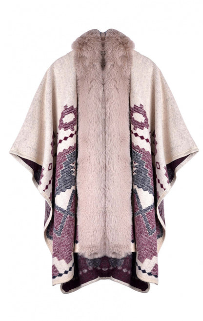 Poncho en jacquard beige à motifs navajos bordeaux et bleus, orné de fausse fourrure beige à l'avant.