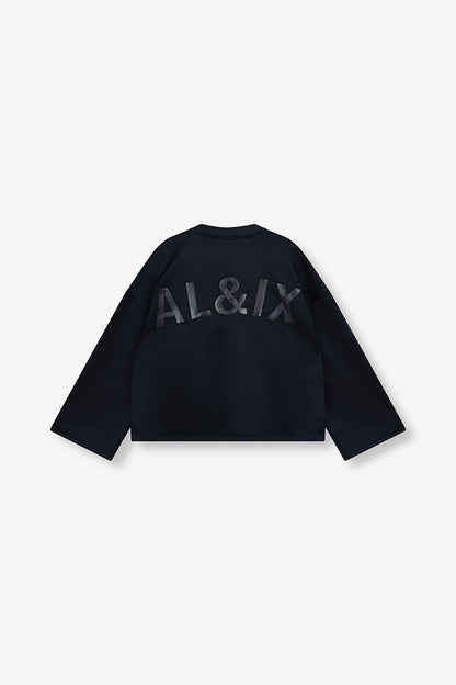 T-shirt sweat noir Alix The Label avec col V et patch effet cuir "AL&IX" dans le dos